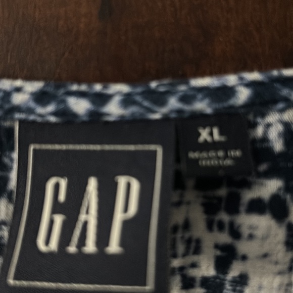 Gap blue and white blouse. Loose fit. Flows nice. Hits around hip - Picture 2 of 3